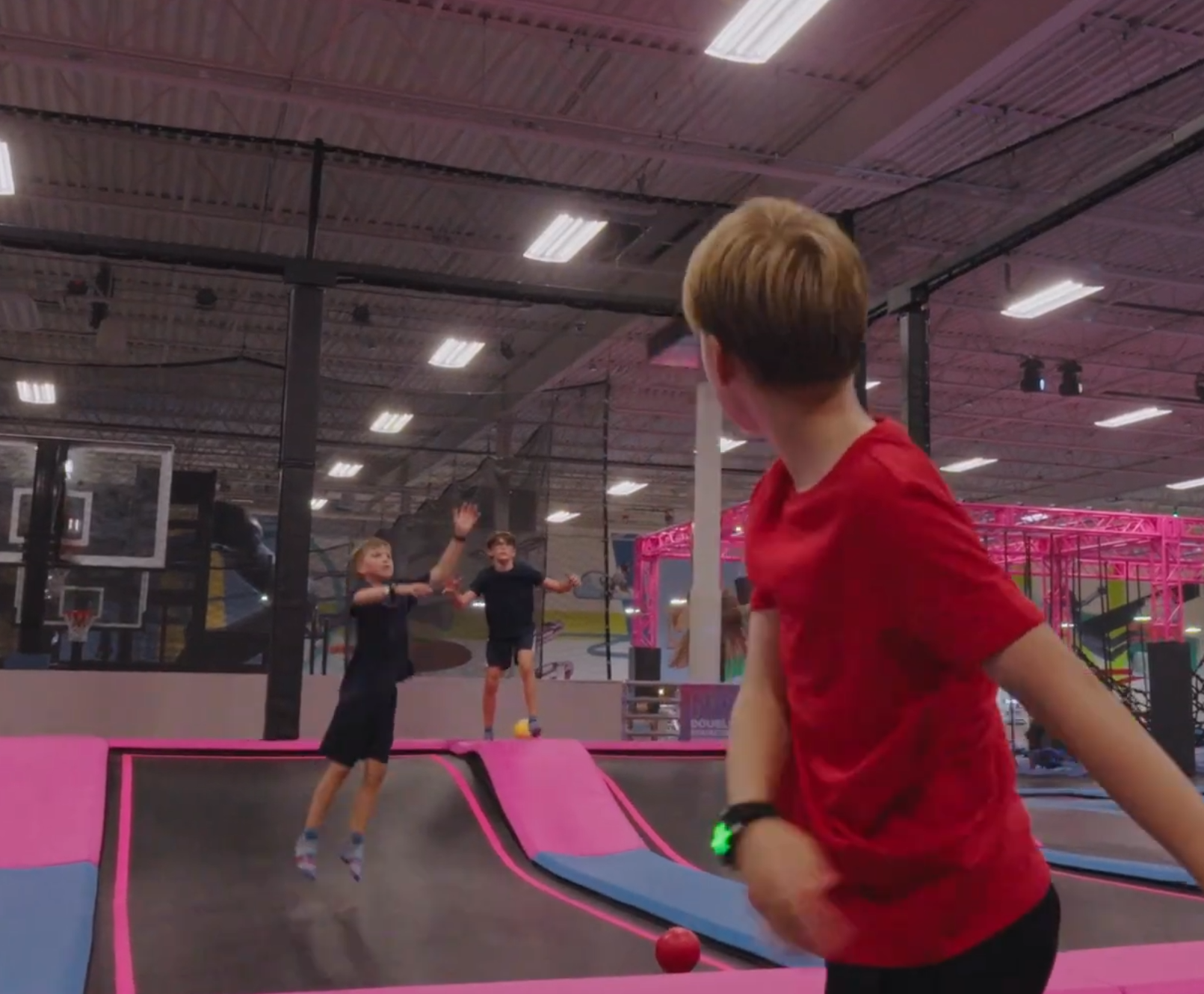 Boy at an Intelliplay-equipped trampoline park